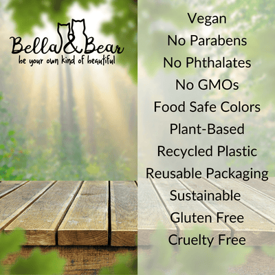 Bella and Bear display with Hello Glow face mask on wooden table listing vegan cruelty free and sustainable features